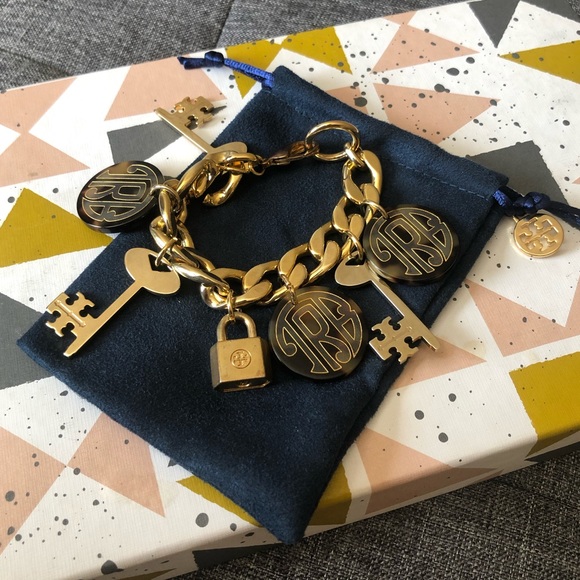 Tory Burch Jewelry - Tory Burch VGUC Luggage Tag Gold Charm Bracelet